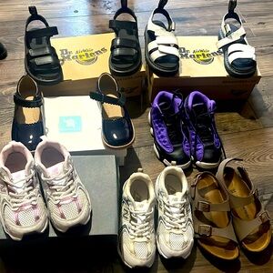 Girl Birkenstock sandals, Dr. Martens sandals, new balance and Jordans